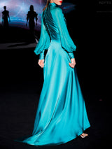 Vestido de fiesta realizado en satín color verde | HANNIBAL LAGUNA.
