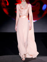 Vestido de fiesta realizado en satin y gasa color salmon y collar de swarovski | HANNIBAL LAGUNA.