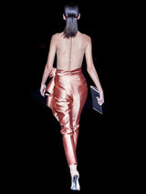 a man standing on a tennis court holding a racquet