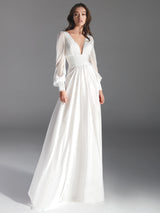Vestido URSULA de Hannibal Laguna Couture. Vestido de Novia en en gasa de seda color natural con escote "V" y fajín drapeado.