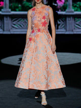 Vestido de fiesta en tul bordado multicolor y organza flocada de Hannibal Laguna.