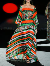 Vestido de noche realizado en gasa devoré estampado escote cuadrado, mangas XL y amplia falda de vuelo de Hannibal Laguna