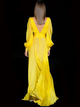 Vestido gasa color maiz drapeado de Hannibal Laguna