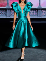 Vestido midi de fiesta en mikado color lago de Hannibal Laguna