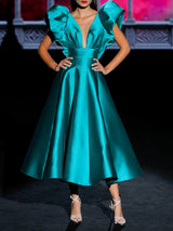 Vestido midi de fiesta en mikado color lago de Hannibal Laguna