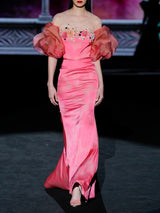 Vestido de fiesta en satin pomelo de Hannibal Laguna