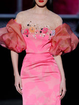 Vestido de fiesta en satin pomelo de Hannibal Laguna