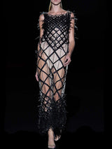 CAPITEL | Vestido tul bordado negro y plumas de Hannibal Laguna