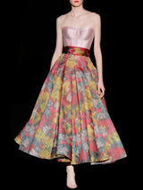 Vestido con corpiño nude y falda de nesgas  de Hannibal Laguna