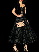 a woman holding a cell phone in her hand