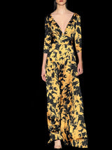 a woman standing in front of a tree