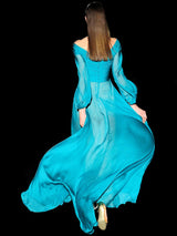 a woman in a blue dress and a blue dress