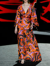 Vestido de noche gasa devoré estampado, escote pico con pliegues, mangas XL y amplia falda de vuelo de Hannibal Laguna