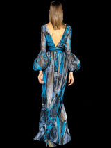 a woman in a blue dress and a blue dress