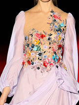 a bride and groom are holding a wedding cake