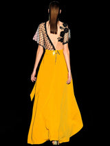 a woman in a yellow dress in a yellow dress