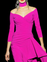 Vestido largo de fiesta en crepe morado con escote liz y falda sirena con recogido de Hannibal Laguna