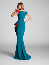 a woman in a green dress is holding a skateboard
