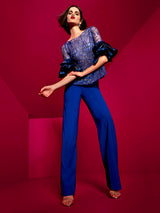 Vestido CITY de Hannibal Laguna Couture. Conjunto de blusa joya con originales mangas abullonada y elegante pantalón.