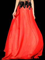 a red haired girl wearing a red dress