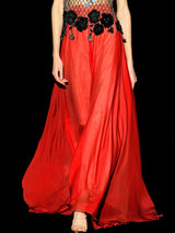 a woman in a red dress in a red dress