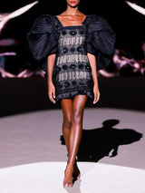 LOOK 1 Vestido NERO | Vestido de fiesta corto bordado con azabache y cristal negro, flecos y mangas XXL plisadas