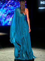 LOOK 24 Vestido MURANA | Vestido de fiesta en gasa azul petróleo con escote palabra de honor y falda de gran caída, bajo vivo oro