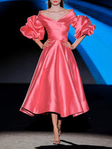 LOOK 33 Vestido MONTIBELO | Vestido de fiesta midi en mikado coral con escote bardot cruzado, mangas abullonadas y falda de nesgas