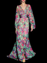 Vestido largo de fiesta realizado en plumeti estampado con motivos florales y escote V de Hannibal Laguna