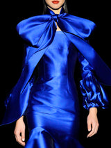 Vestido BOLDINIA de Hannibal Laguna Couture. Vestido cocktail en mikado azul royal con falda recta y gran volante de capa.