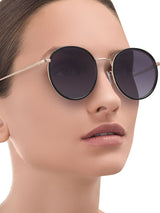 a woman wearing sunglasses and a sunglasses and a sunglasses 