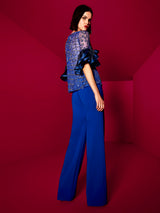 Vestido CITY  de Hannibal Laguna Couture. Conjunto de blusa joya con originales mangas abullonada y elegante pantalón.