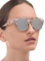 a woman wearing sunglasses and a sunglasses wearing glasses 