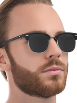 a close up of a person wearing sunglasses 