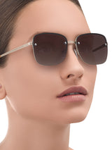 a woman wearing sunglasses and a glasses 